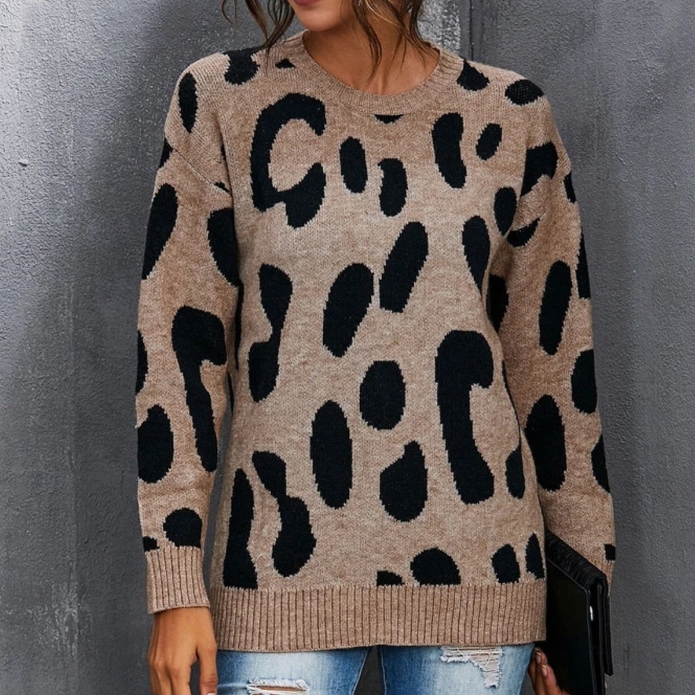Beautiful woman leopard print sweater